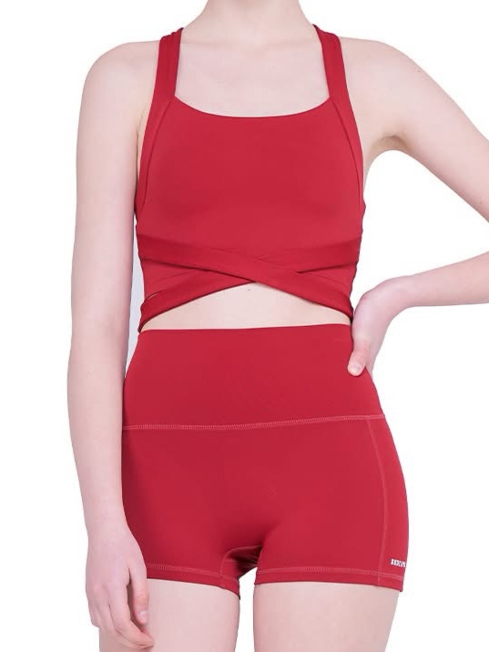 SKULLPIG - CROSS FRONT SPORTS BRA. Brick red. Has removable cups. 
Size: Large.